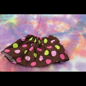Brown, pink and green polka dot skirt